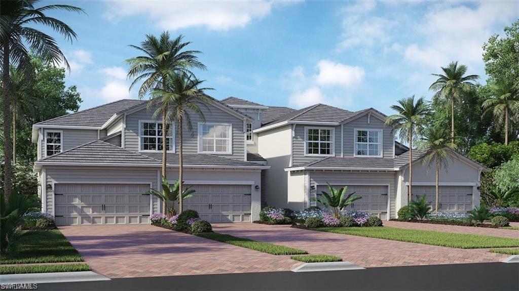 View of front of property with a garage