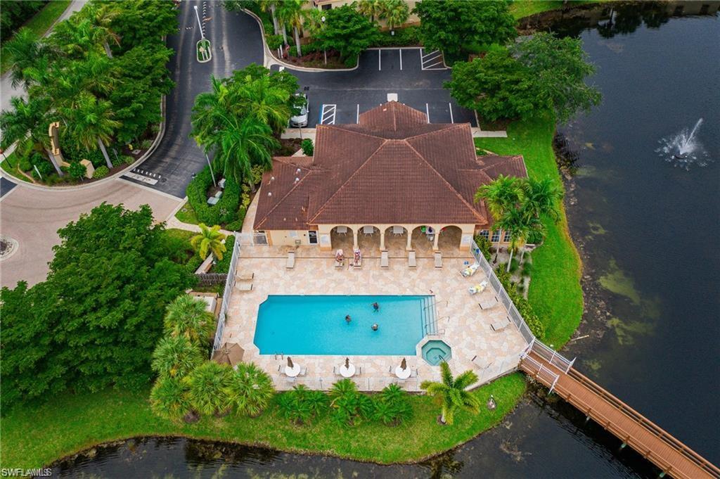 Aerial view of a nearby body of water and a pool area