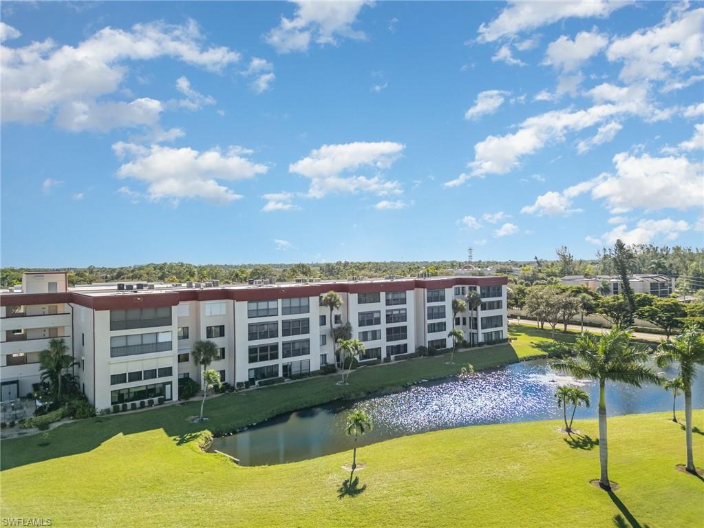 Back of building #23 with view of the lake and golf course
