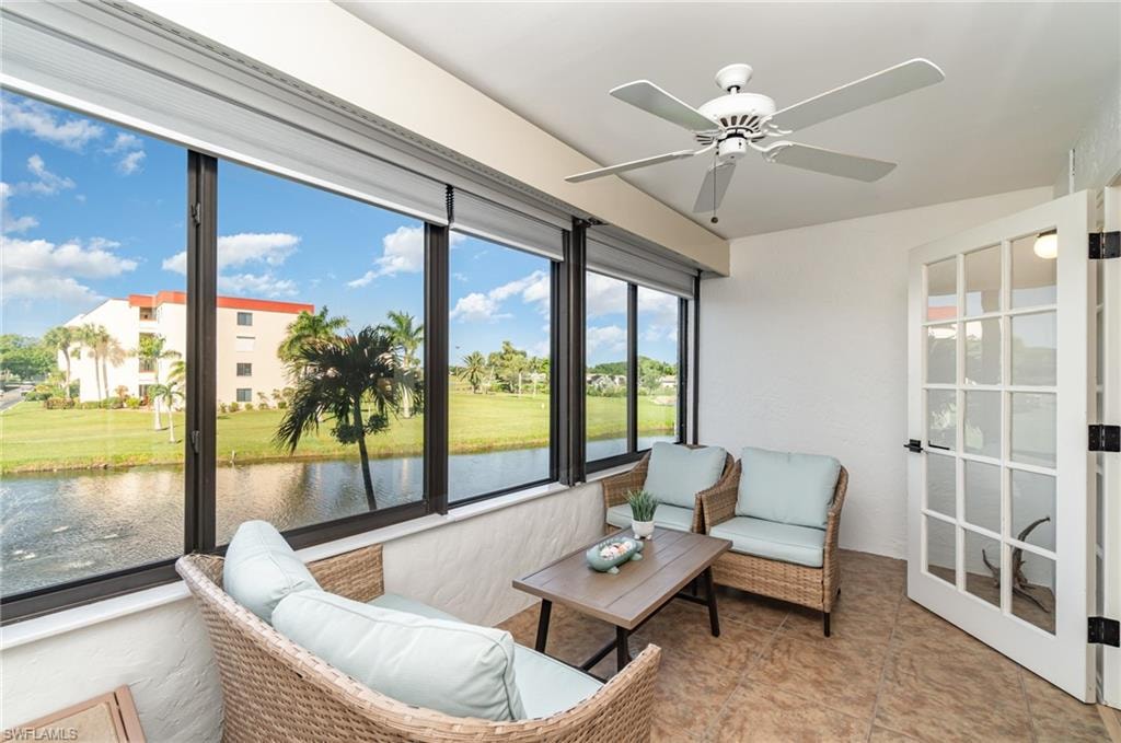 Lanai with western lake view, sliding hurricane resistant windows and french doors