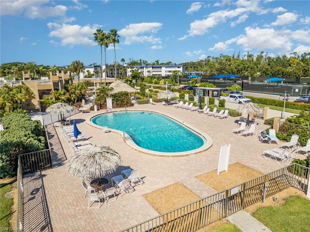 Community pool with a patio area