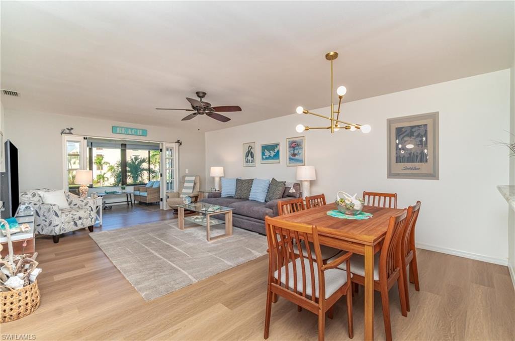 Open floor plan with dining area, living room and lanai