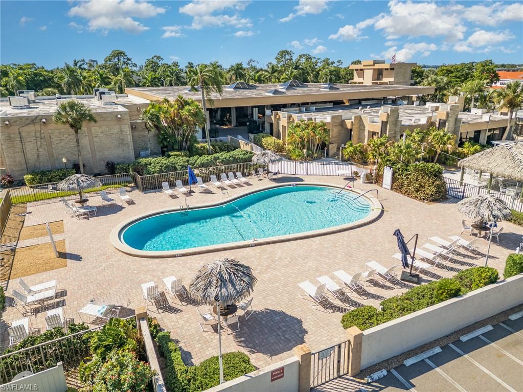 Community pool with a patio and access to clubhouse