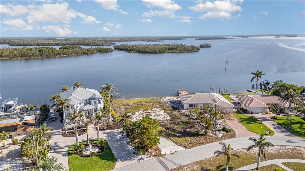 Aerial View of oversized (.35 acre) Bay Front Residential lot ready for a new Coastal Home with a View!