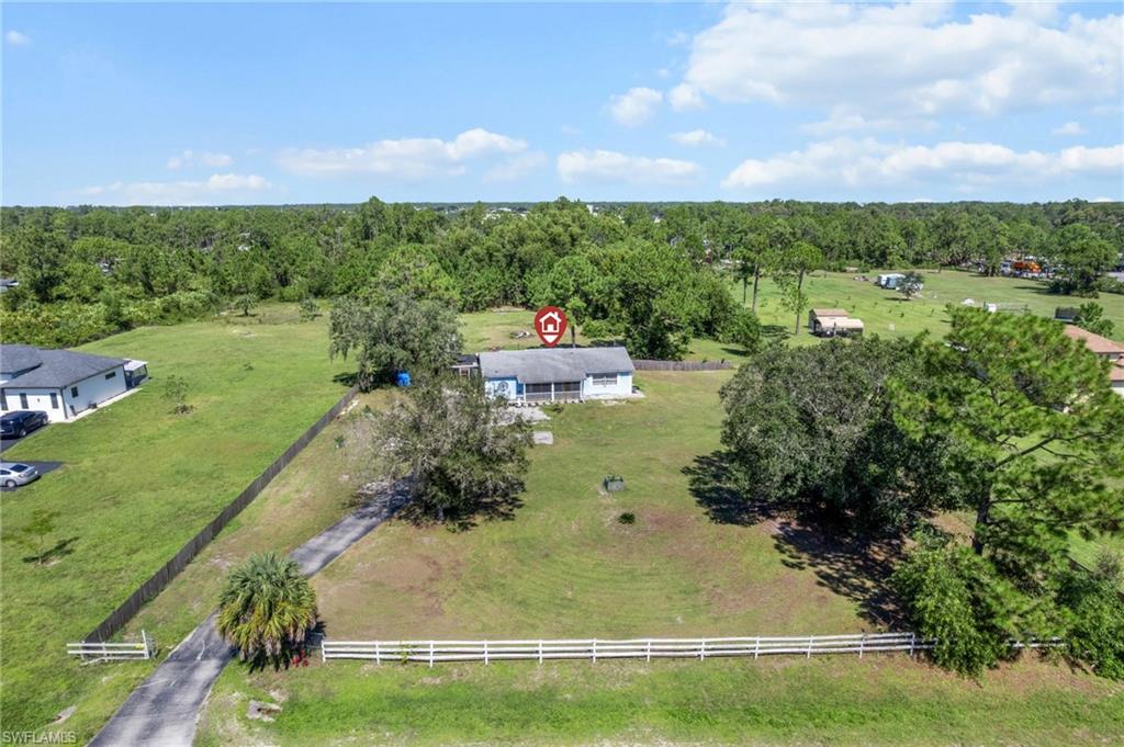 Aerial view of sparsely populated area with a pastoral area