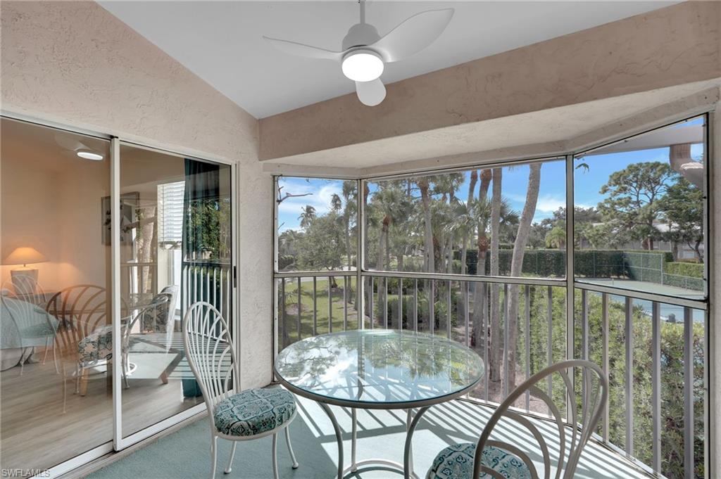Screened balcony with double sliders allowing tons of natural light into the space