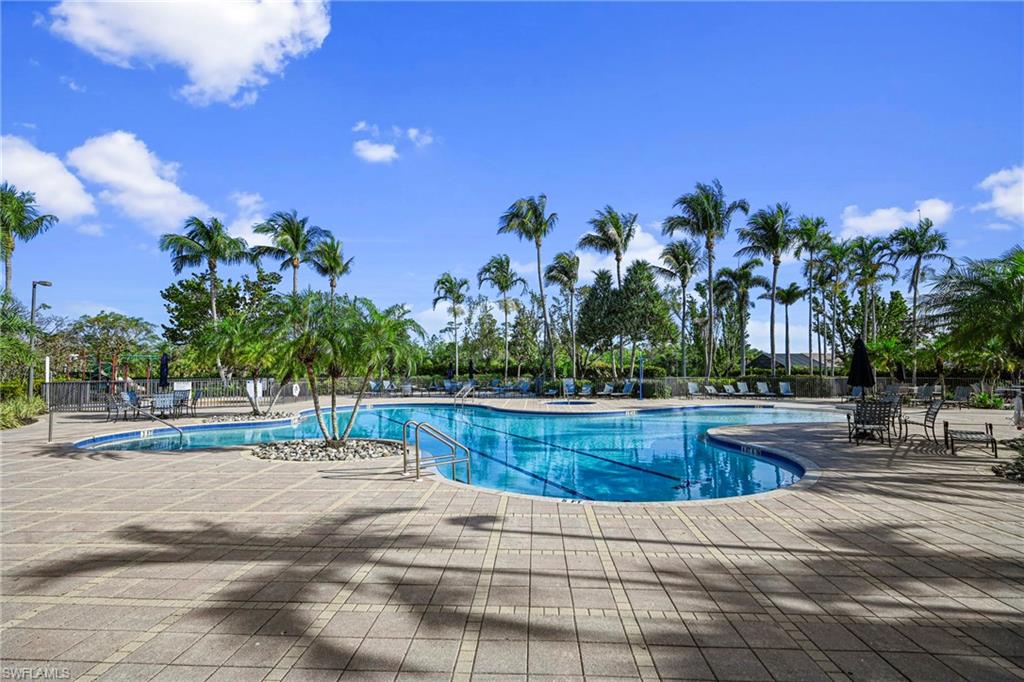Community pool with a patio area