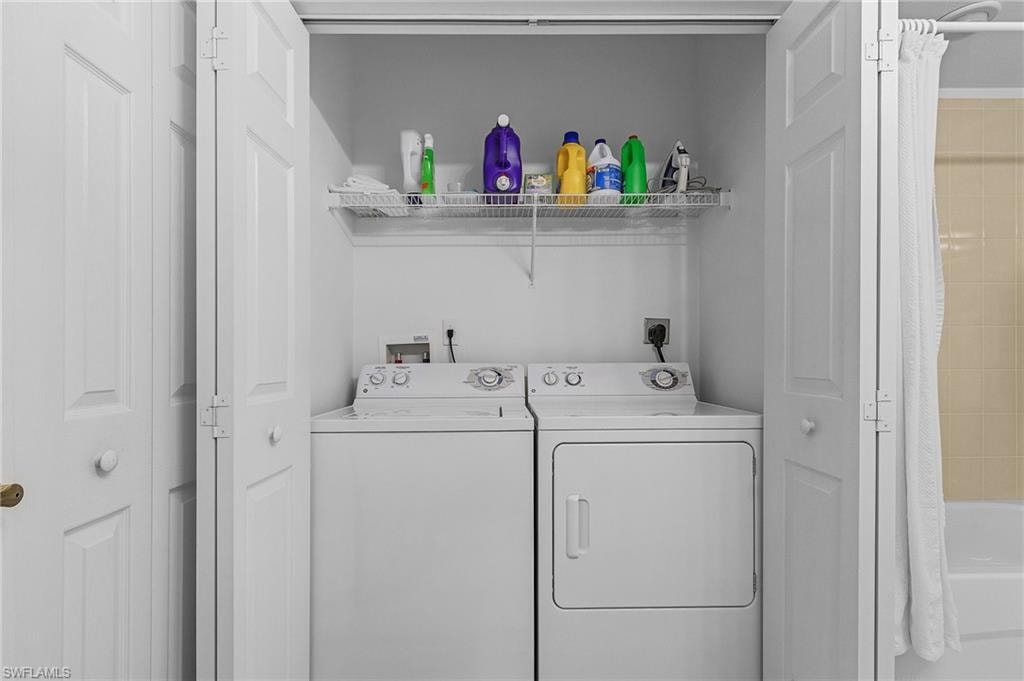 Laundry area closet with washer and dryer.