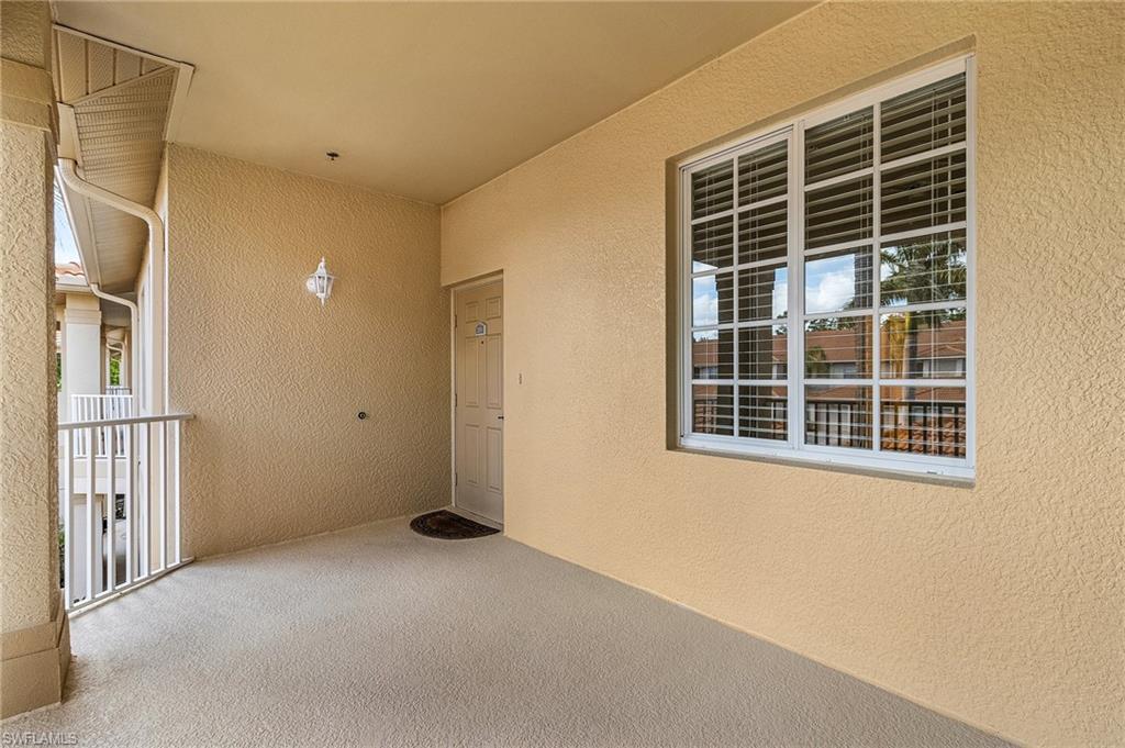 Second floor hall leading to front entrance.
