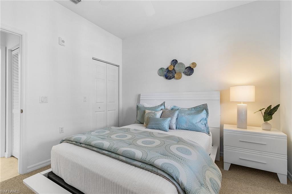 Second bedroom off front main foyer with ample closet space.