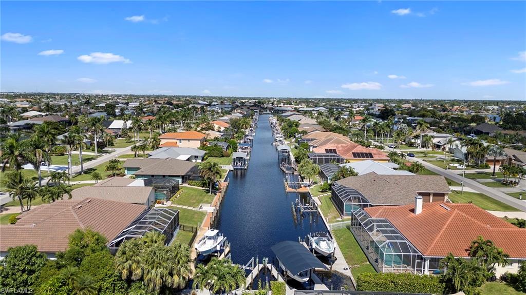Aerial view of residential area with a large body of water