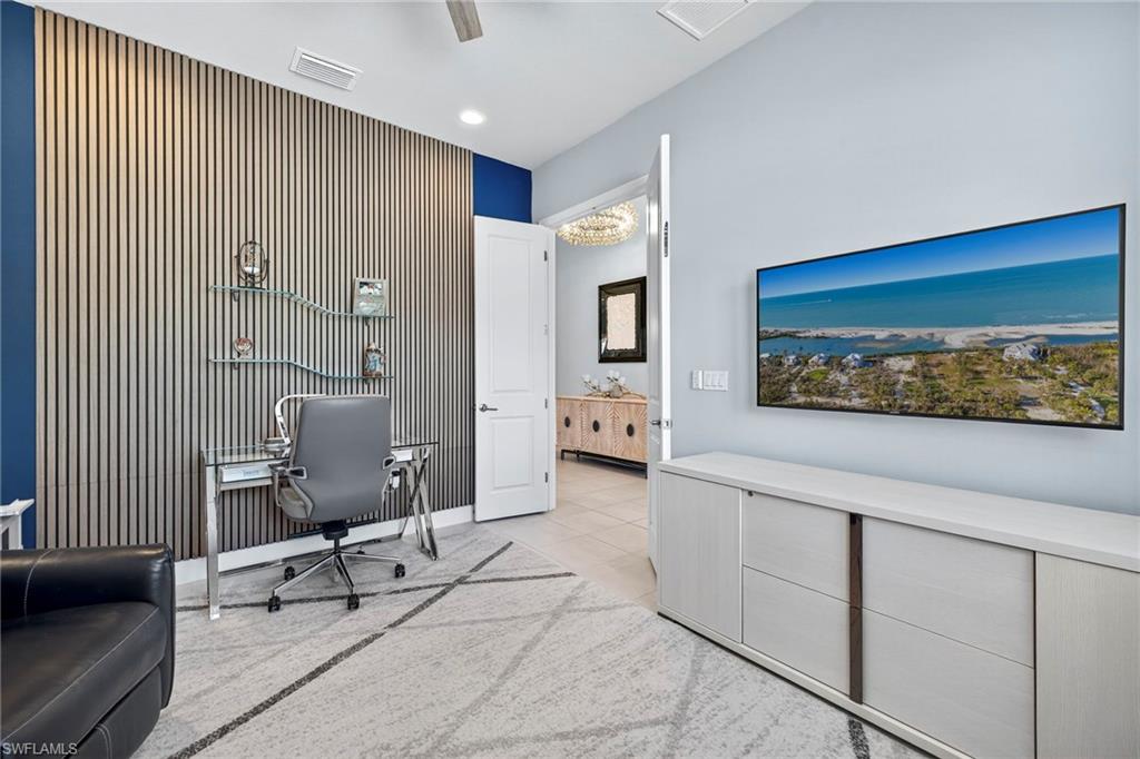 Den or 3rd Bedroom - Wall behind the desk is dual purpose: pretty PLUS sound reducing!
