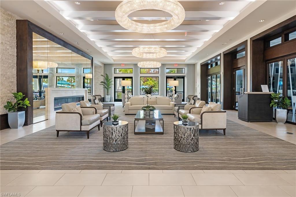 Impressive entry to clubhouse with fireplace; between ballroom and restaurant!