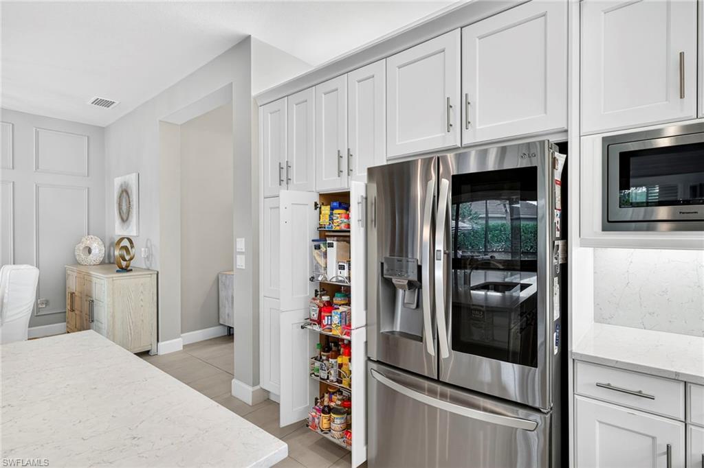 Upgraded appliances plus pull-outs in pantry and every lower level cabinet!