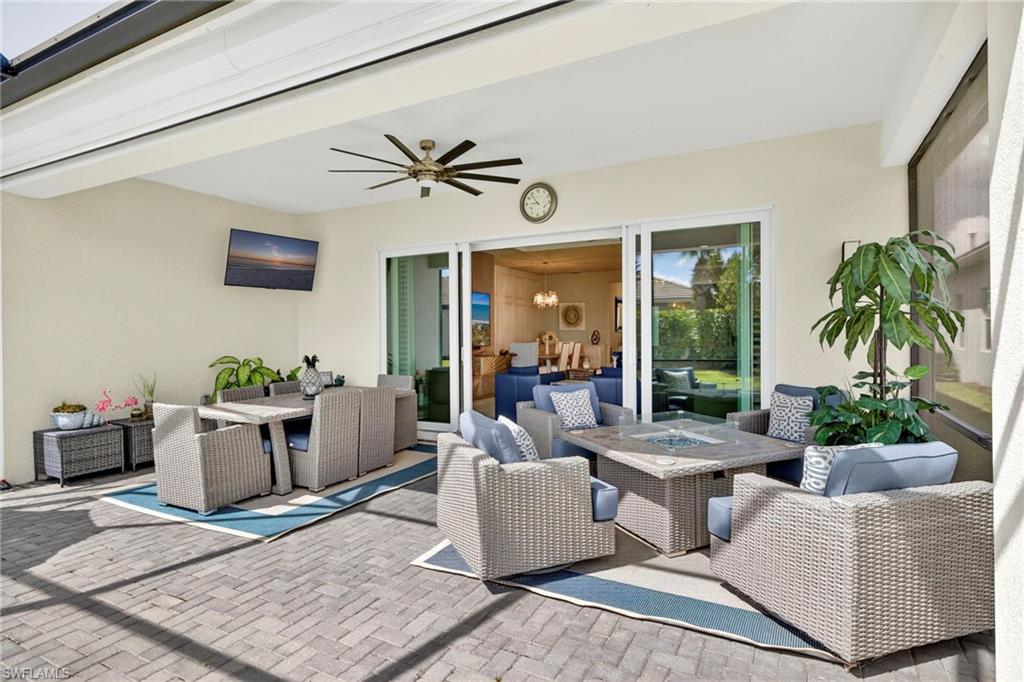 Enjoy the football games while lounging on your rear lanai! Center opening doors from great room...