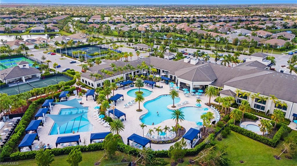 Aerial view of our community including 4 pools and sport courts!