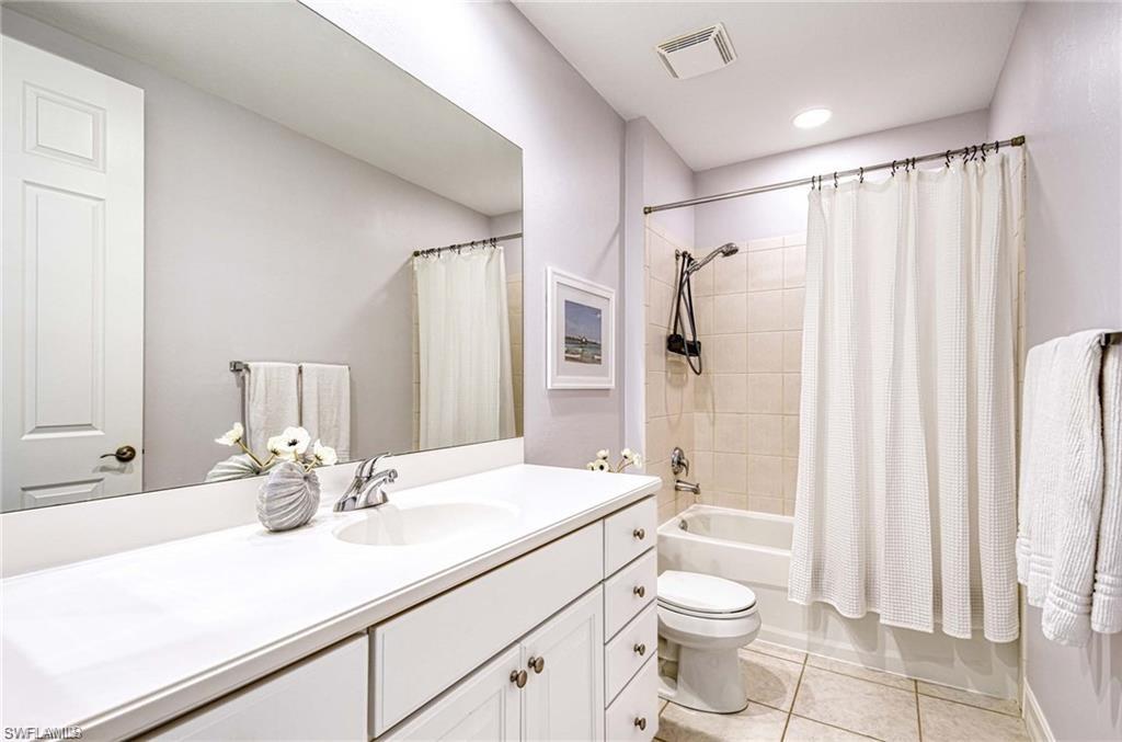 Main bath with tub and shower