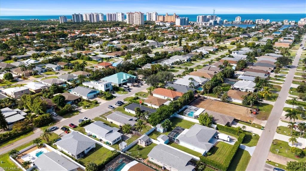 View of property location with nearby suburban area