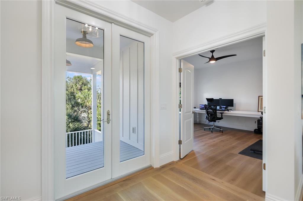 Doorway to outside with hardwood / wood-style floors