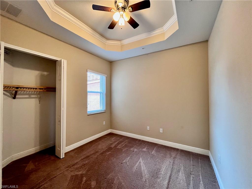 Flex space could be used as a den or as a bedroom, French doors, a tray ceiling, ceiling fan, and a closet