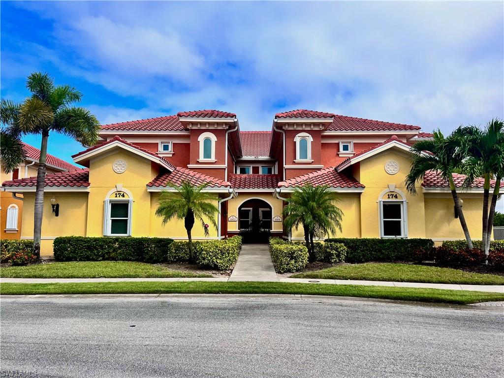 Mediterranean / spanish-style house featuring stucco siding