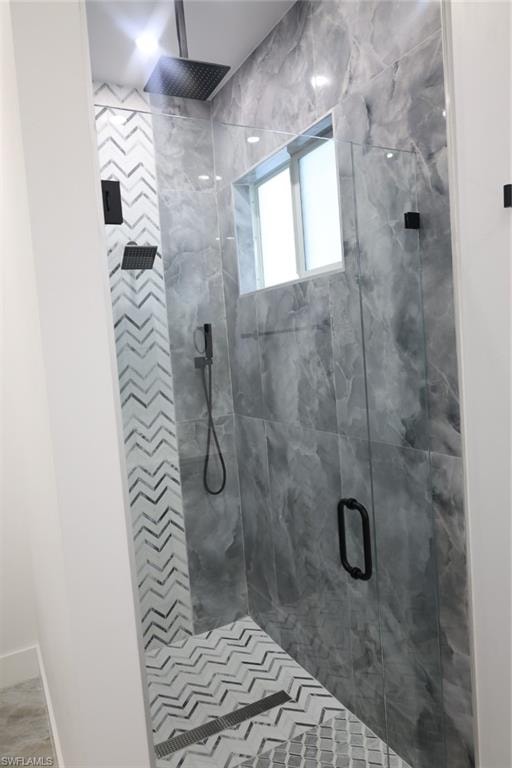Bathroom featuring a stall shower