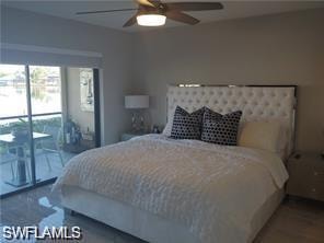 Bedroom with a ceiling fan and access to exterior