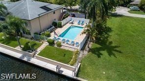 View from above of property with a pool area