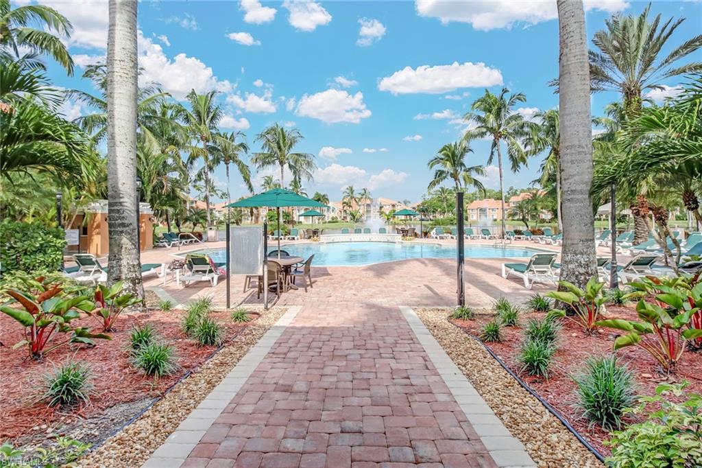 Community pool featuring a patio