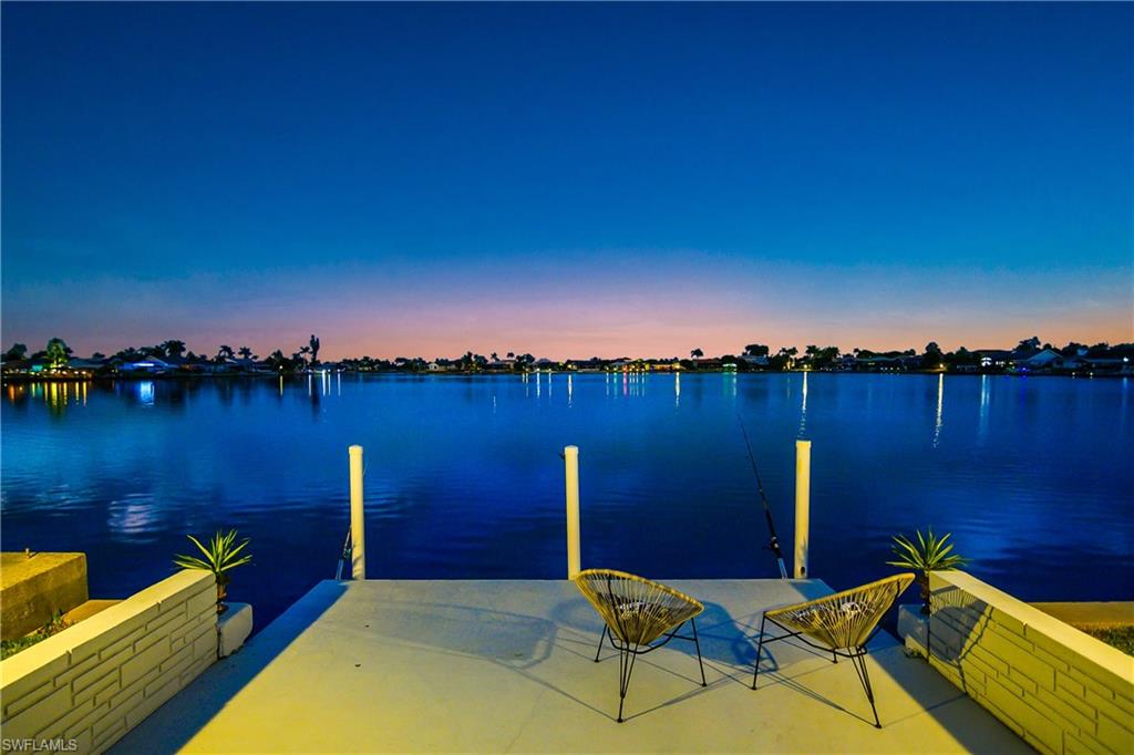 Dock featuring a water view