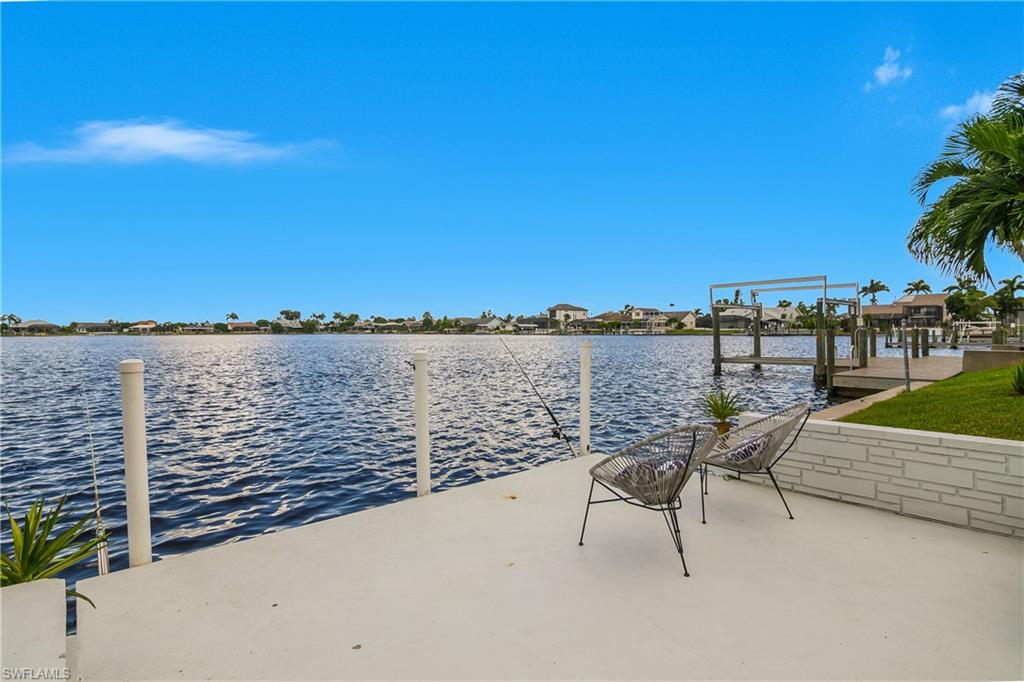 Dock featuring a water view