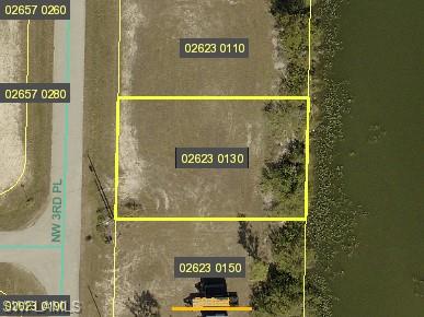 Aerial overview of property's location with property parcel outlined