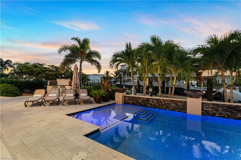Swimming pool with a patio