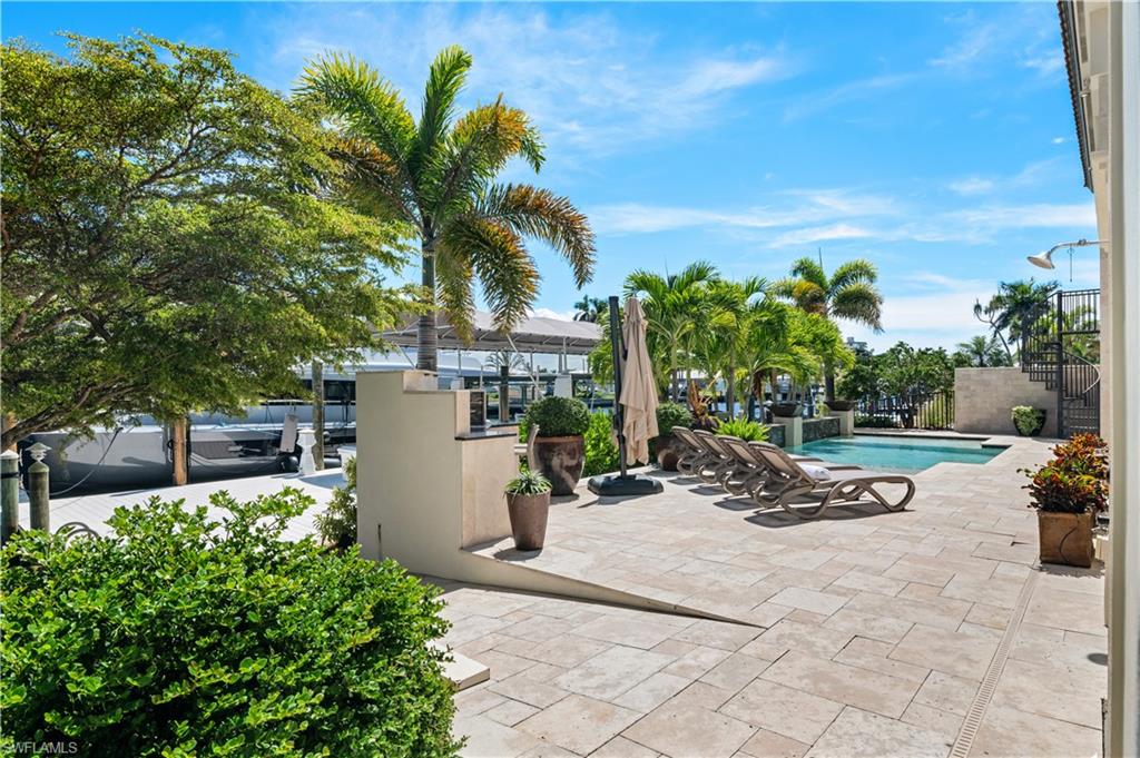 Swimming pool with a patio area