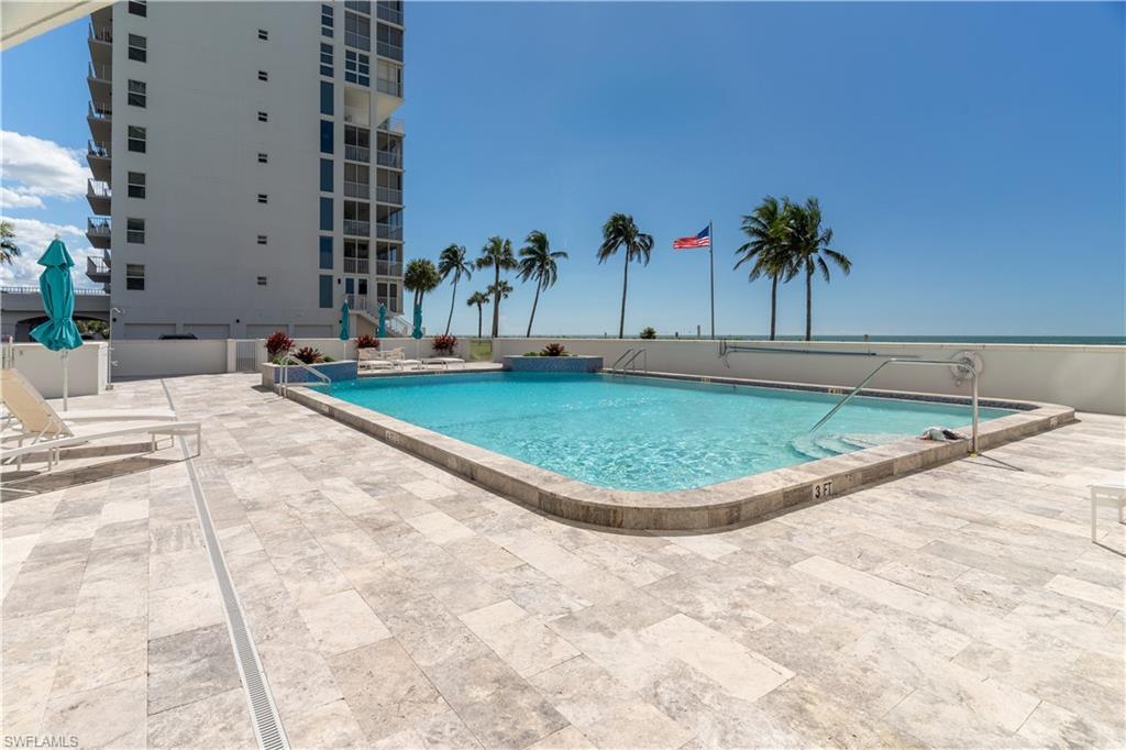 Community pool with a patio area