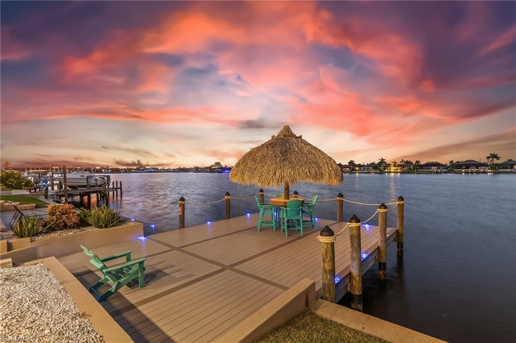 Dock with a water view and boat lift