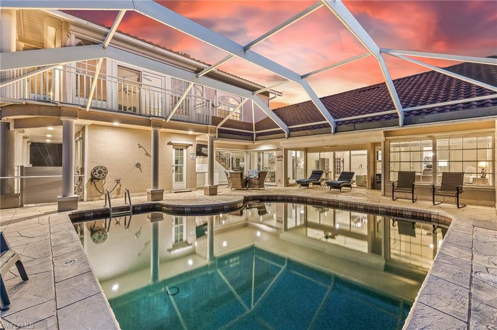 Swimming pool with a sunroom
