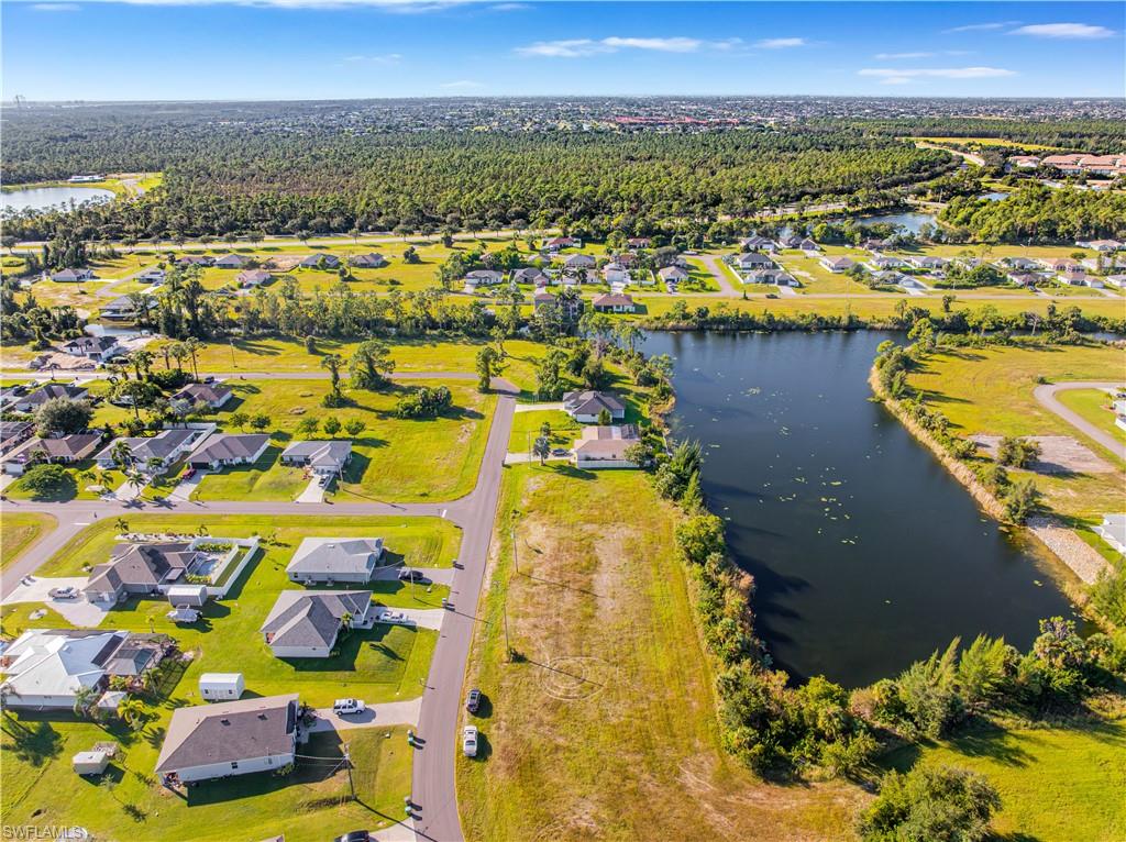 Aerial view of residential area with a nearby body of water