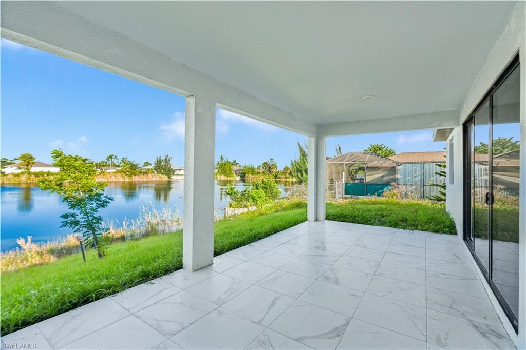 View of patio featuring a water view