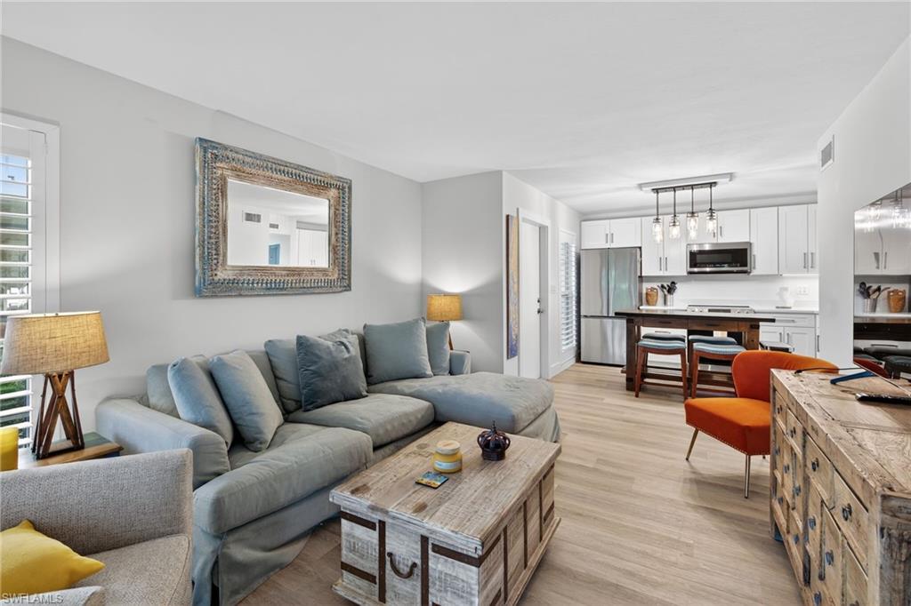 Living area featuring light wood-style flooring