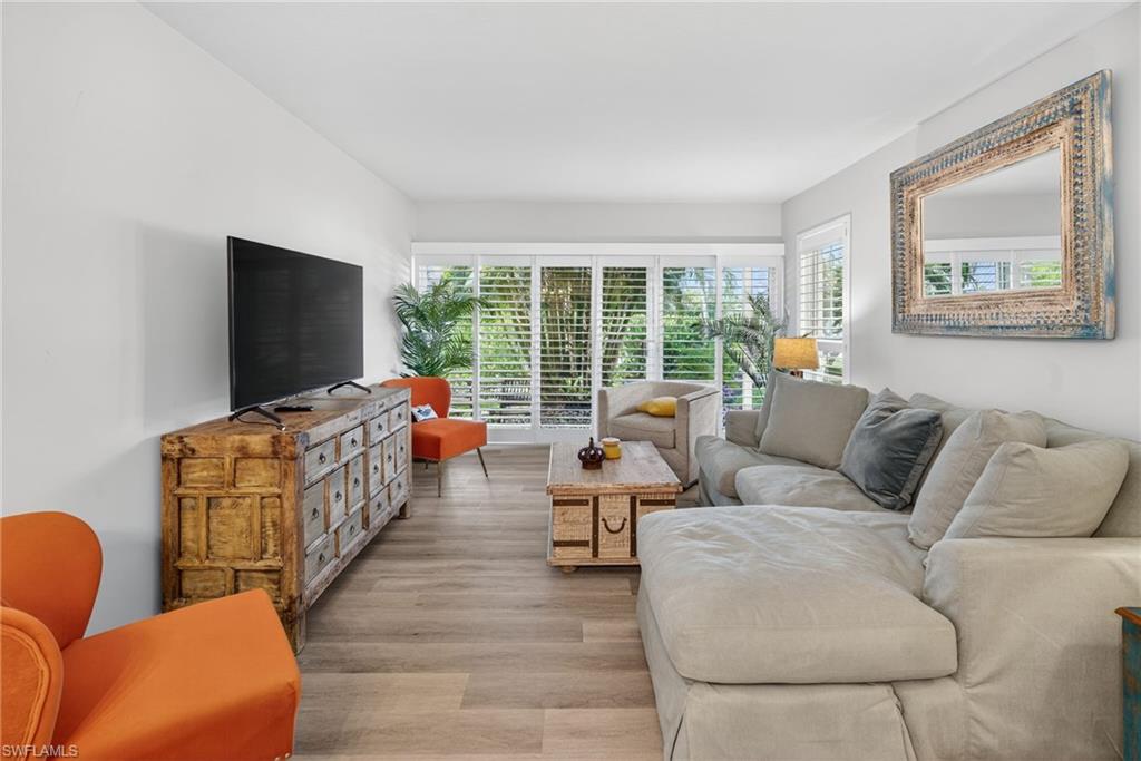Living area with wood finished floors
