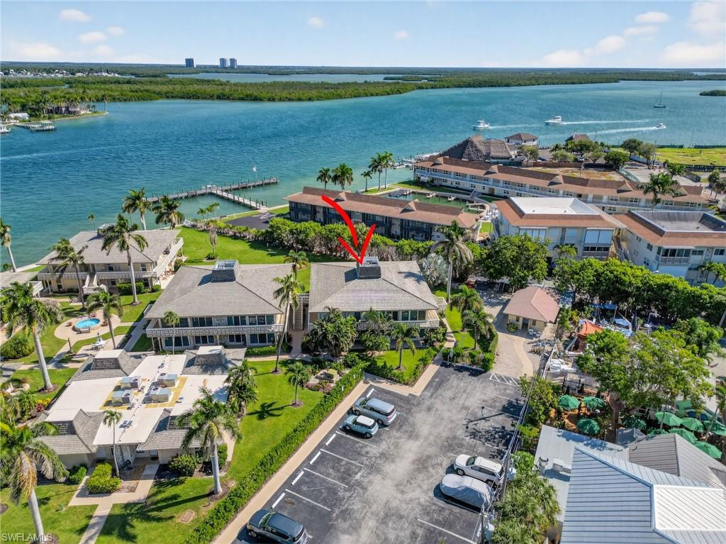 Aerial view of residential area with a nearby body of water