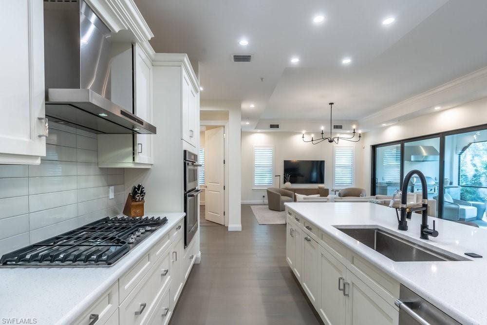 white cabinets, gas cooking