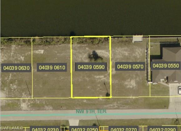 Aerial map of property and surrounding area with property parcel outlined