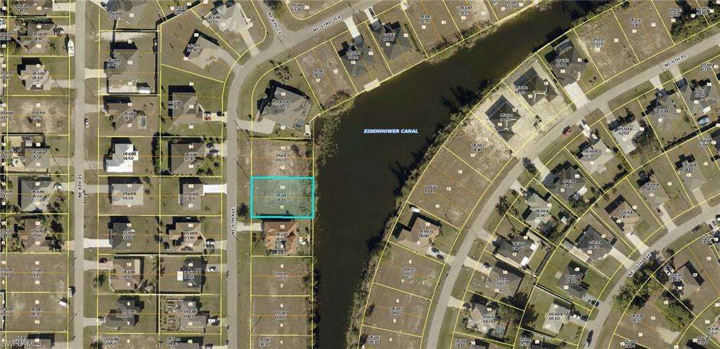 Aerial map of property and surrounding area featuring property parcel outlined