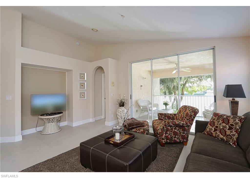 Living room with lofted ceiling