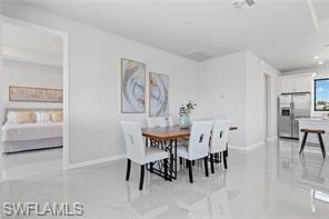 Dining space featuring baseboards