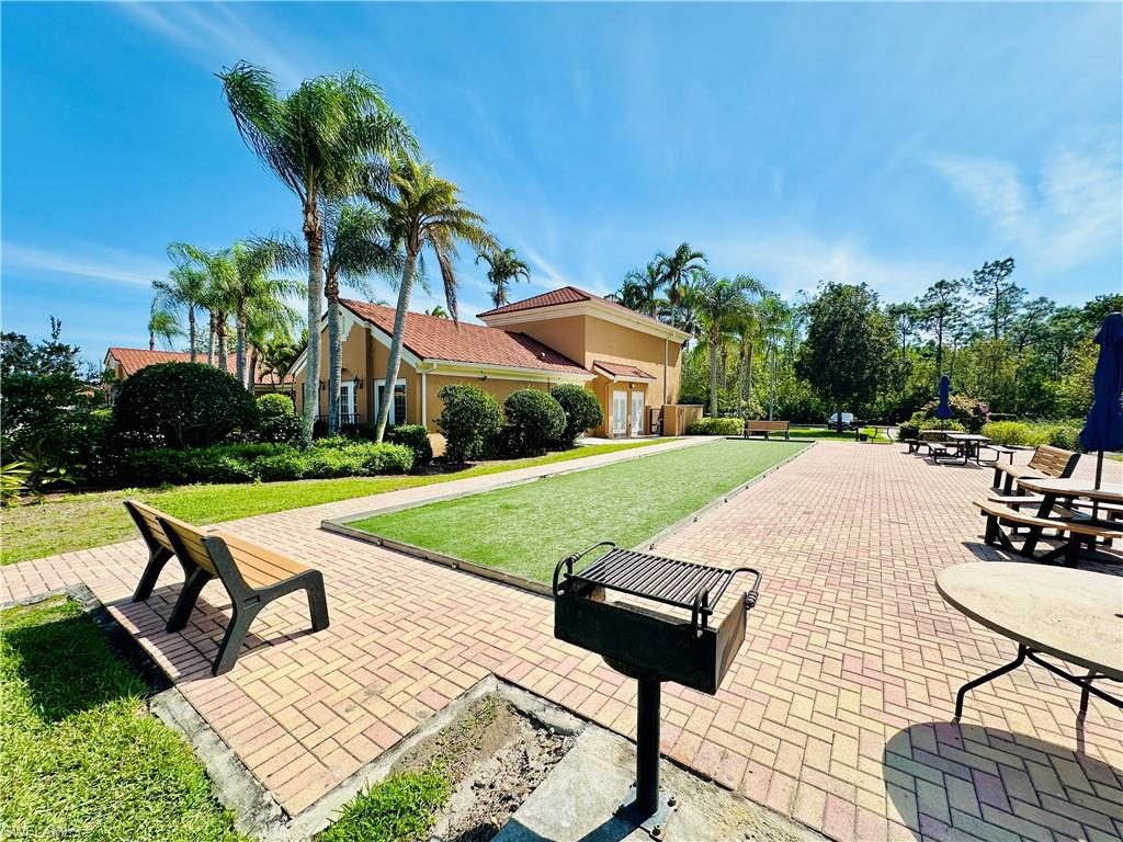 View of patio featuring a bocce ball area