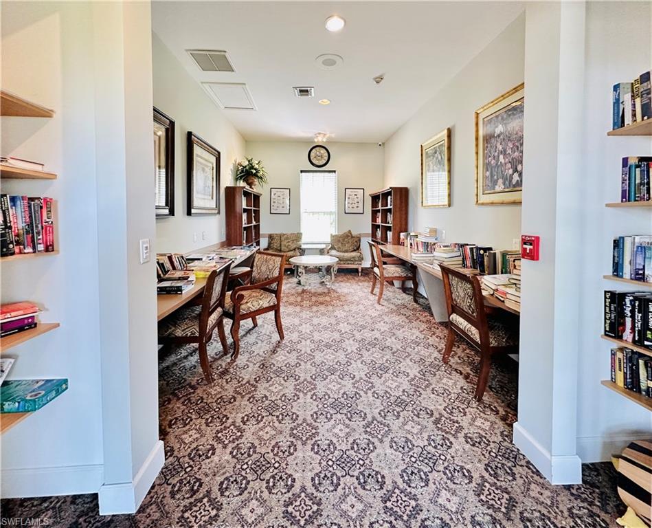 Office with recessed lighting and baseboards
