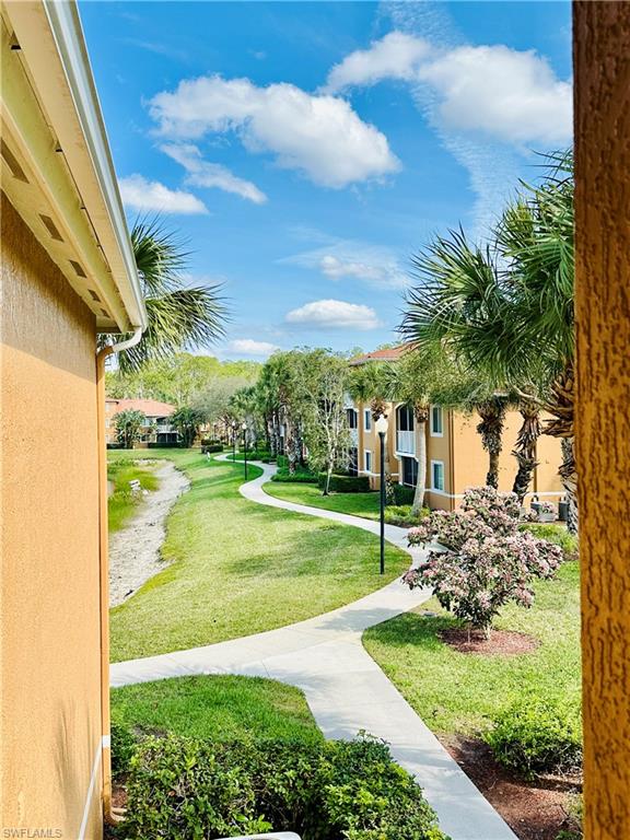 View of community with a yard